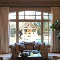 Cream Drapes with Curtain Rod in Living room