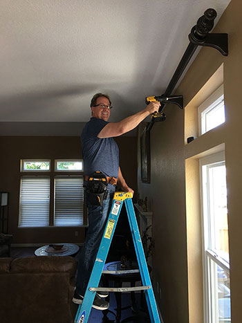 Jack Alter doing a window covering installation