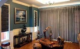 Gray Roman Shades & Ripplefold Drapes in Art Room